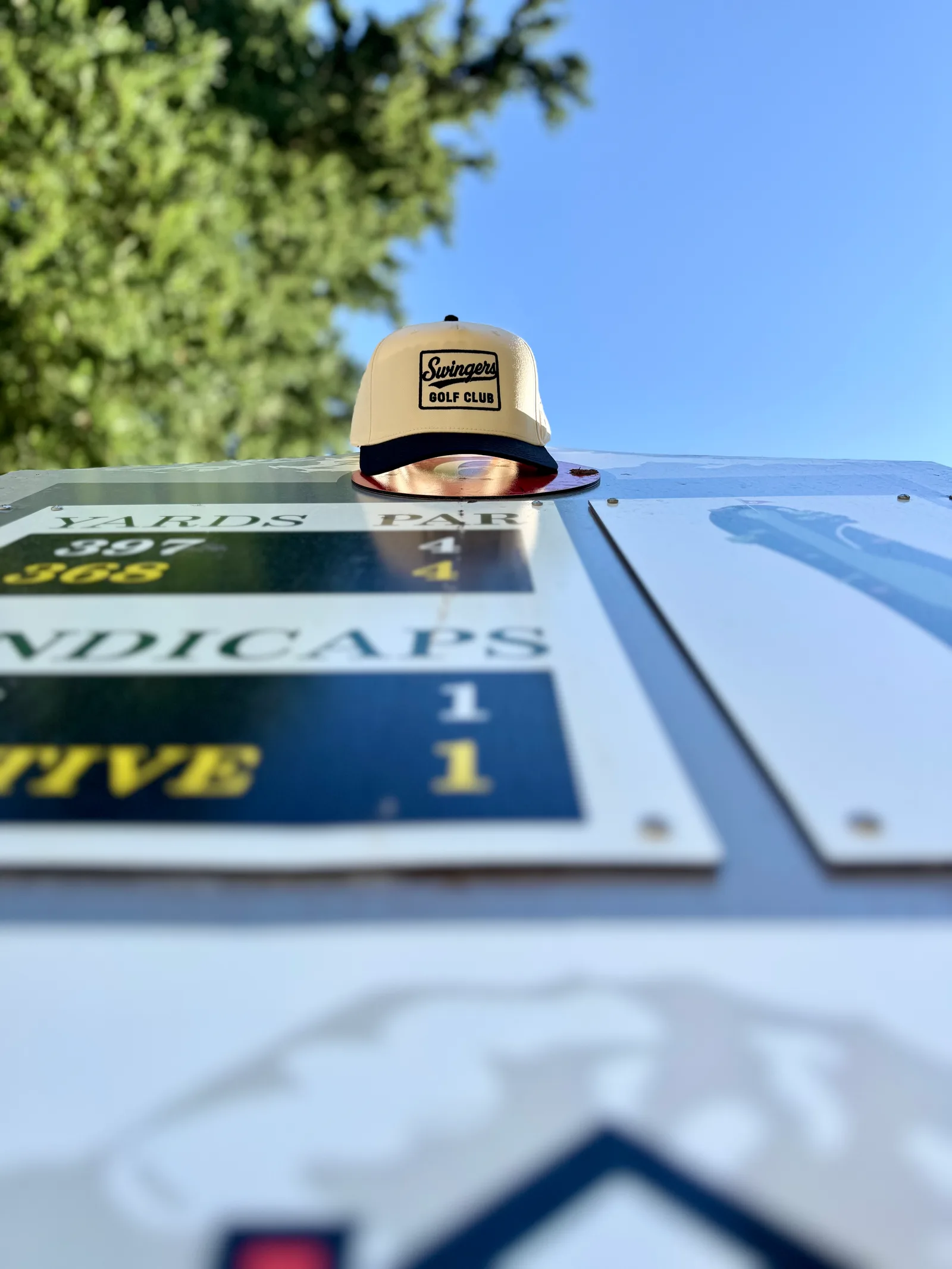 Golfer teeing off in Swingers Club polo